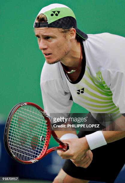 Lleyton Hewitt of Australia waits for Gael Monfils of France to serve during their second round match at the ATP Shanghai Masters tennis tournament...