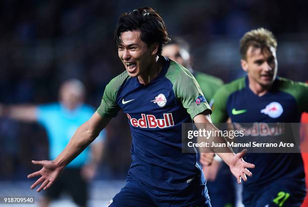 Takumi Minamino of FC Red Bull Salzburg celebrates after scoring during UEFA Europa League Round of 32 match between Real Sociedad and FC Red Bull...