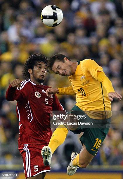 Harry Kewell of Australia heads the ball during the Asian Cup Group B qualifying match between the Australian Socceroos and Oman at Etihad Stadium on...