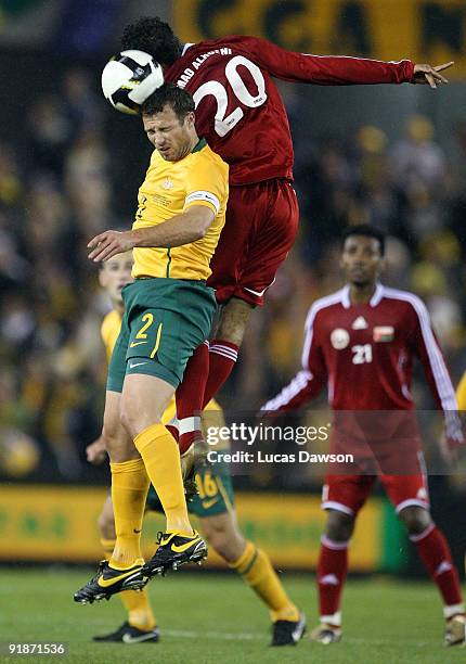 Lucas Neill of Australia heads the ball during the Asian Cup Group B qualifying match between the Australian Socceroos and Oman at Etihad Stadium on...