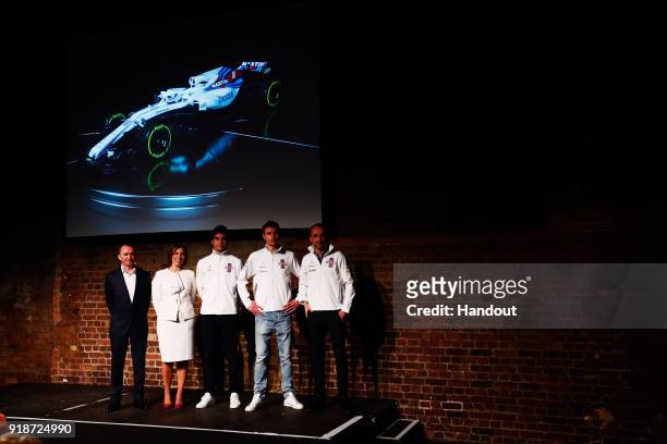 In this handout photo supplied by Williams F1, the team including Paddy Lowe, Chief Technical Officer of Williams F1, Williams Deputy Team Principal...