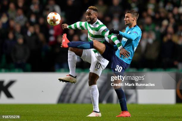 Moussa Dembele of Celtic and Emanuel Mammana of Zenit St. Petersburg during UEFA Europa League Round of 32 match between Celtic and Zenit St...