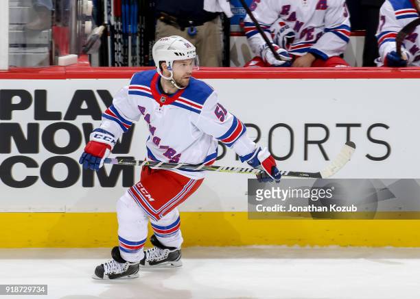 David Desharnais of the New York Rangers keeps an eye on the play during second period action against the Winnipeg Jets at the Bell MTS Place on...