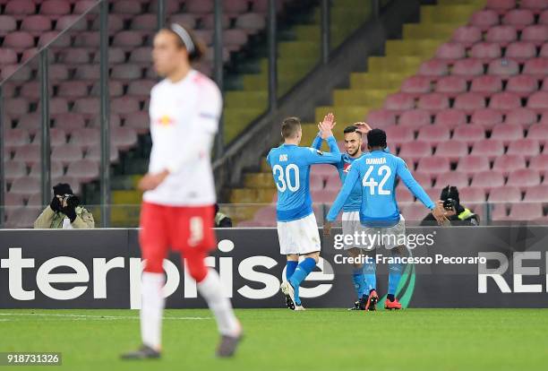 Players of SSC Napoli Adam Ounas, Marko Rog and Amadou Diawara celebrate the 1-0 goal scored by Adam Ounas, beside the disappointment of Yussuf...