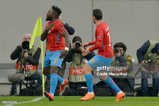 Harlem Gnohere of Steaua Bucharest celebrates a opening goal during UEFA Europa League Round of 32 match between Steaua Bucharest and Lazio at the...