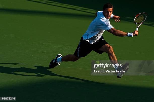 Marat Safin of Russia returns a shot to Tomas Berdych of the Czech Republic during day four of 2009 Shanghai ATP Masters 1000 at the Qi Zhong Tennis...