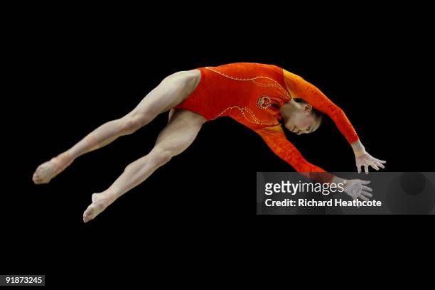 Yilin Yang of China competes in the balance beam event during the second day of the Artistic Gymnastics World Championships 2009 at O2 Arena on...