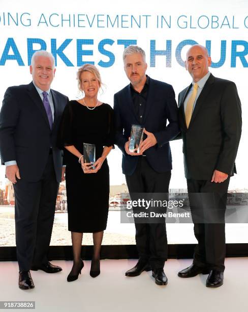 Gary Sherwin and Gregg Schwenk present Lisa Bruce and Anthony McCarten with the Outstanding Achievement in Global Cinema honour for 'Darkest Hour' at...