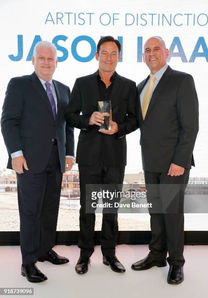 Gary Sherwin and Gregg Schwenk present Jason Isaacs with an Artist of Distinction honour at the Newport Beach Film Festival UK Honours in association...