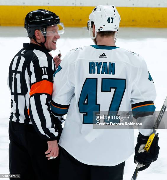 Joakim Ryan of the San Jose Sharks chats with referee Kelly Sutherland during an intermission of the game against the Anaheim Ducks on February 11,...