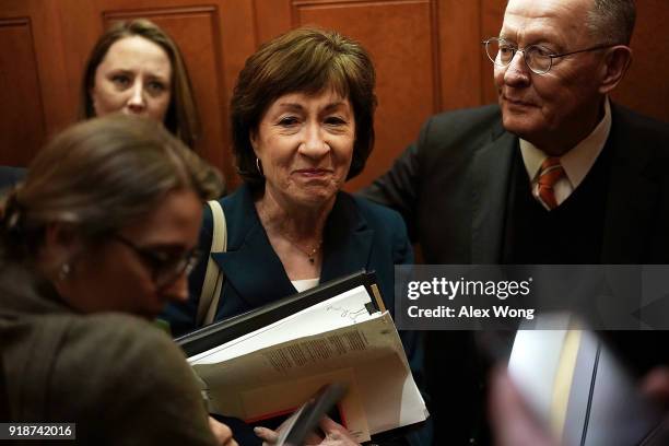 Sen. Susan Collins leaves with Sen. Lamar Alexander after votes at the Capitol February 15, 2018 in Washington, DC. A bipartisan DACA\boarder...