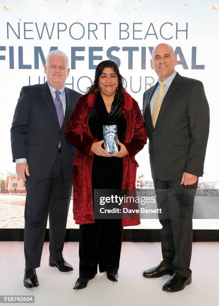 Gary Sherwin and Gregg Schwenk present Gurinder Chadha with the Icon Award at the Newport Beach Film Festival UK Honours in association with Visit...