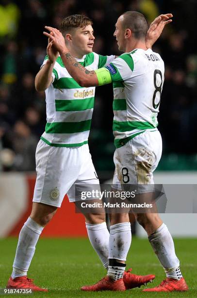 Scott Brown of Celtic and James Forrest of Celtic at the final whistle during UEFA Europa League Round of 32 match between Celtic and Zenit St...