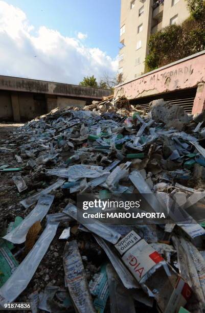 View of remains of syringes used by drug addicts discovered during an operation against drug smugglers in Scampia, a quarter of Naples called "il...