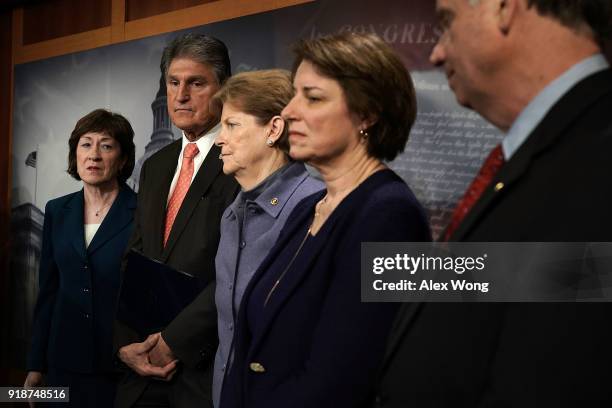 Sen. Susan Collins , Sen. Joe Manchin , Sen. Jeanne Shaheen and Sen. Amy Klobuchar listen during a news conference February 15, 2018 at the Capitol...