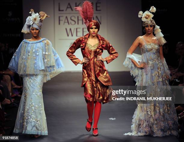 Models showcase creations by designer Rajesh Pratap Singh during a special 10th year commemorative show featuring 20 Indian designers on the first...