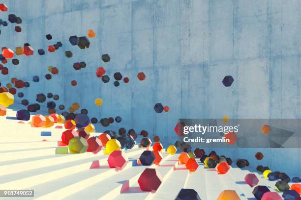 large group of glowing elements falling down the urban concrete stairs - balls bouncing stock pictures, royalty-free photos & images