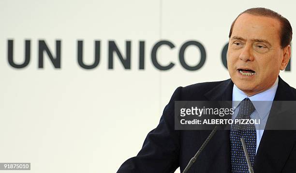 Italy's Prime minister Silvio Berlusconi delivers a speech during a meeting about the new hubs of Rome's Fiumicino and Milan's Malpensa airports on...
