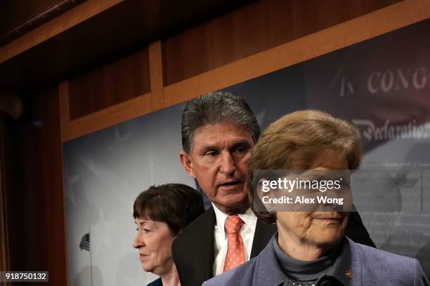 Sen. Susan Collins , Sen. Joe Manchin and Sen. Jeanne Shaheen listen during a news conference February 15, 2018 at the Capitol in Washington, DC. The...