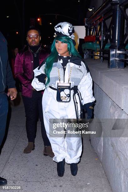 Lil' Kim seen leaving a New York Fashion event in Manhattan on February 14, 2018 in New York City.