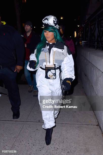 Lil' Kim seen leaving a New York Fashion event in Manhattan on February 14, 2018 in New York City.