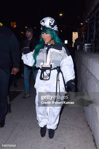 Lil' Kim seen leaving a New York Fashion event in Manhattan on February 14, 2018 in New York City.