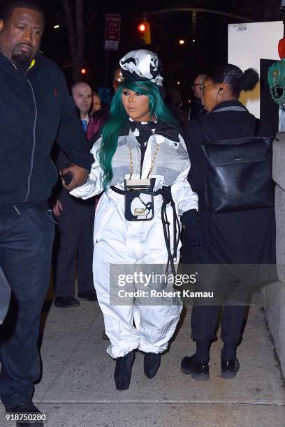 Lil' Kim seen leaving a New York Fashion event in Manhattan on February 14, 2018 in New York City.