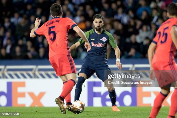 Yuguruza of Real Sociedad, Moanes Dabour of Red Bull Salzburg during the UEFA Europa League match between Real Sociedad v Salzburg at the Estadio...