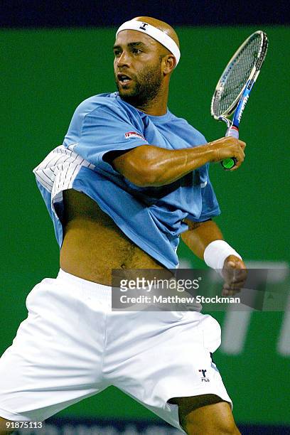 James Blake of the United States returns a shot to Rafael Nadal of Spain during the 2009 Shanghai ATP Masters 1000 at Qi Zhong Tennis Centre on...