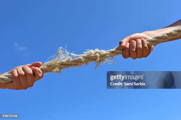 Two Hand Rope Pull Two Hands Pulling A Rope Photos and Premium High Res Pictures - Getty ...