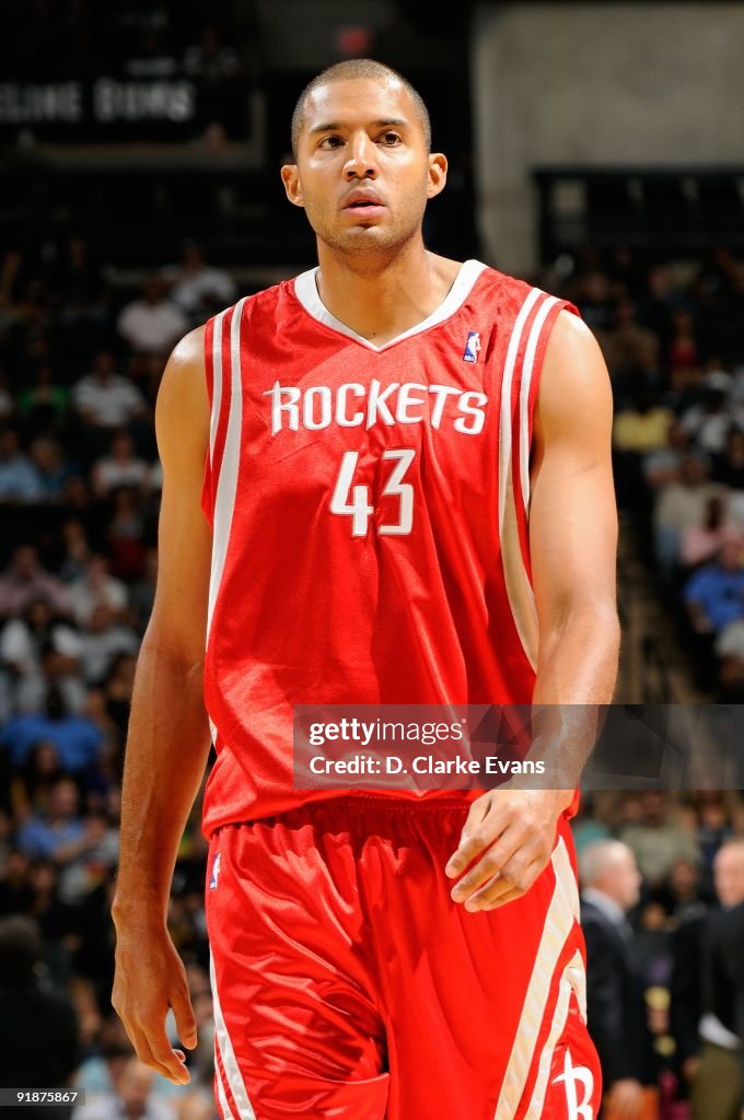 Brian Reeves Houston Rockets Brian Cook of the Houston Rockets walks on the court during the... News ...