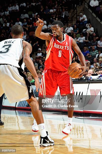 Aaron Brooks of the Houston Rockets sets up the play against the San Antonio Spurs during the preseason game on October 6, 2009 at the AT&T Center in...
