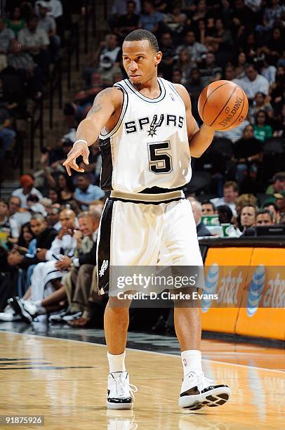 Curtis Jerrells of the San Antonio Spurs sets up the play against the Houston Rockets during the preseason game on October 6, 2009 at the AT&T Center...