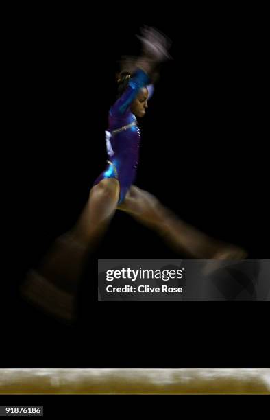 Leysha Lopez Recci of Porto Rico competes in the balance beam event during the second day of the Artistic Gymnastics World Championships 2009 at O2...