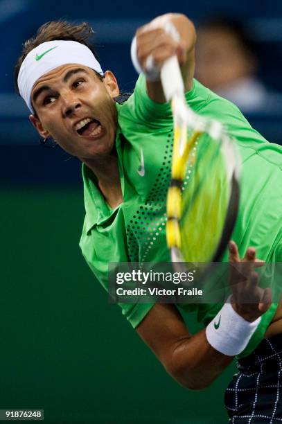 Rafael Nadal of Spain serves to James Blake of the United States during day four of 2009 Shanghai ATP Masters 1000 at the Qi Zhong Tennis Centre on...