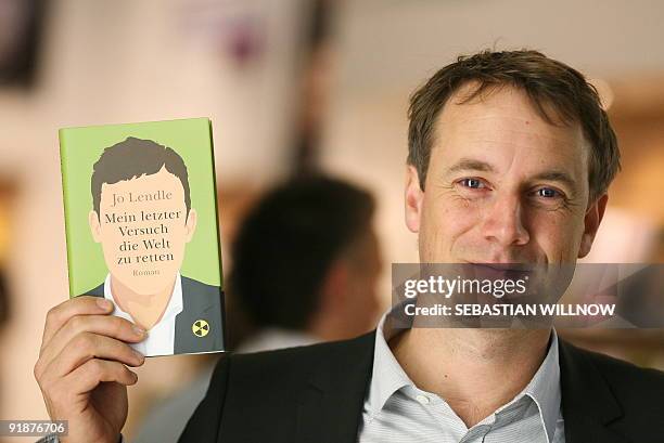 German author Jo Lendle poses as he presents his book "Mein letzter Versuch die Welt zu retten" at the International Book Fair in the central German...