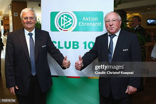 Theo Zwanziger, president of the German Football Association and football legend Uwe Seeler pose during the honourations of the DFB Award Club 100 at...