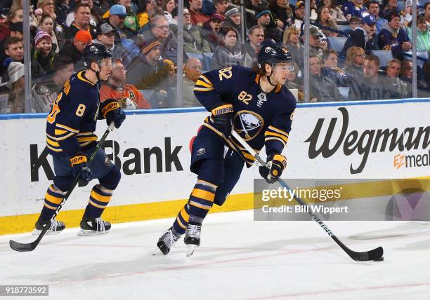 Casey Nelson and Nathan Beaulieu of the Buffalo Sabres skate during an NHL game against the Anaheim Ducks on February 6, 2018 at KeyBank Center in...