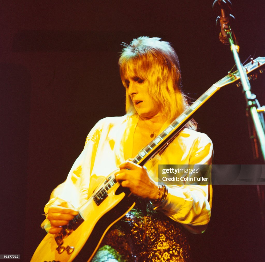 Mitch Ronson Mick Ronson performs on stage with David Bowie and the Spiders from ...