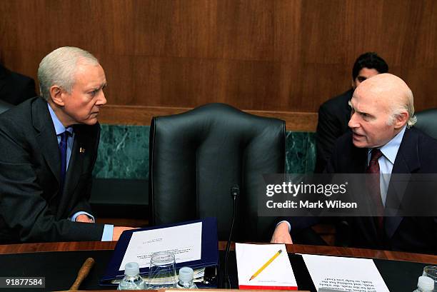 Sen. Orrin Hatch talks with Sen. Herb Kohl during a Senate Judiciary Committee hearing on Capitol Hill on October 14, 2009 in Washington, DC. The...