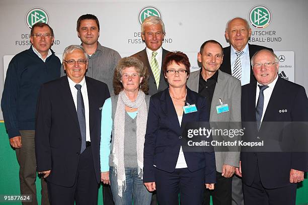 Theo Zwanziger, president of the German Football Association and Uwe Seeler honour the regional German Football organisation of Baden-Wuerttemberg...