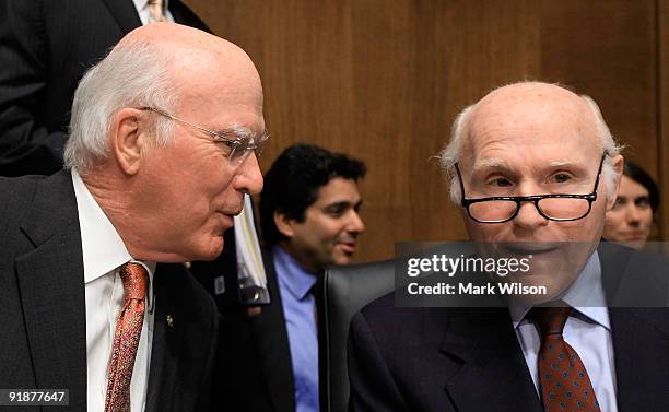 Chairman Patrick Leahy talks with Sen. Herb Kohl during a Senate Judiciary Committee hearing on Capitol Hill on October 14, 2009 in Washington, DC....
