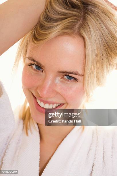 portrait of a young woman smiling, close-up - woman smiling facing down stock pictures, royalty-free photos & images