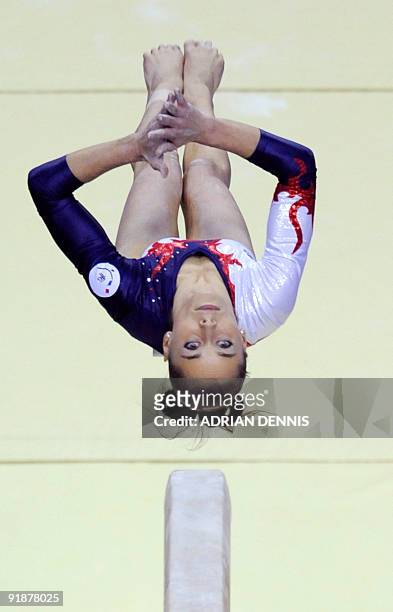 France's Pauline Morel performs in the balance beam event during the Artistic Gymnastics World Championships 2009 at the 02 Arena, in east London, on...