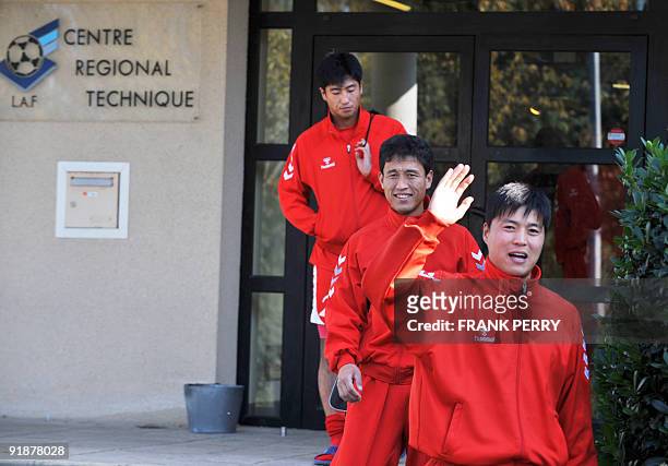 North Korean footballers Cha Jong Hyok and Pak Nam Chol practice, on October 14 at a local football technical center, in Saint-Sebastien-sur-Loire,...