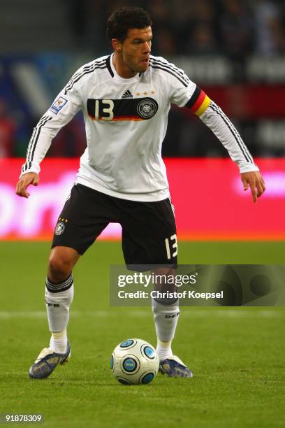 Michael Ballack of Germany runs with the ball during the FIFA 2010 World Cup Group 4 Qualifier match between Germany and Finland at the Hamburg Arena...