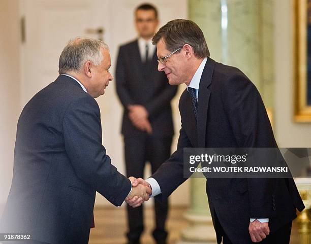 Poland's newly appointed sports minister, Adam Giersz , receives his nomination from Polish President Lech Kaczynski during a ceremony at the...