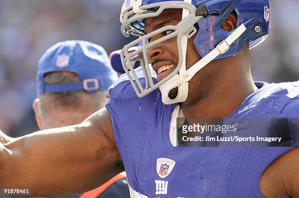Osi Umenyiora of the New York Giants during a NFL game against the Oakland Raiders on October 11, 2009 at Giants Stadium in East Rutherford, New...