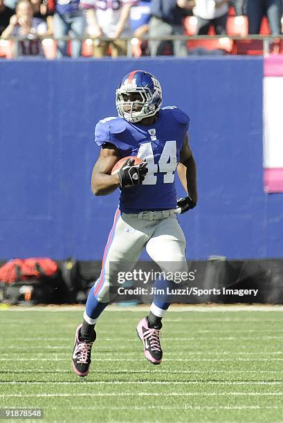 Ahmad Bradshaw of the New York Giants carries the ball during a NFL game against the Oakland Raiders on October 11, 2009 at Giants Stadium in East...