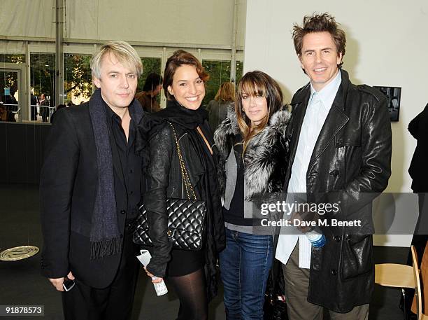 Nick Rhodes and John Taylor attend the private view of the Frieze Art Fair, at Regent's Park on October 14, 2009 in London, England.